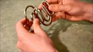 Double M Metal Ring Puzzle SOLUTION [upl. by Gnivre319]