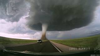 Storm chasing dashcam Tornado crossing the highway Laramie Wyoming [upl. by Sallee]