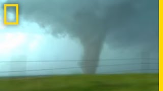 Tornadoes Lightning in Rare Video  National Geographic [upl. by Accisej462]