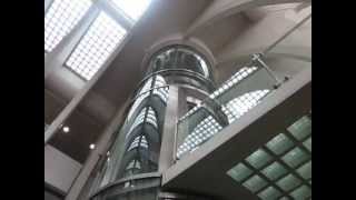 Schindler hydraulic glass elevator at Guillemins railway station in Liège [upl. by Eetnahs8]